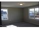 Bedroom featuring neutral walls, plush carpeting, and two large windows at 1415 Reading Ct # 77Kl, Burlington, NC 27217