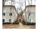 Exterior shot of condos with central walkway at 1430 Collegiate Cir # 102, Raleigh, NC 27606