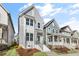 Attractive home with light-blue siding, white trim, and a well-maintained front yard and porch at 1662 Piney Fls Dr, Wendell, NC 27591