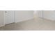 Bright bedroom featuring neutral carpet, crisp white walls, and minimalist trim at 1705 Post Oak Dr, Haw River, NC 27258