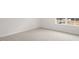 Bedroom featuring carpeting and large windows for natural light at 1705 Post Oak Dr, Haw River, NC 27258