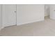 Bedroom with neutral carpet, white walls, and simple trim at 1705 Post Oak Dr, Haw River, NC 27258