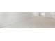 Bright bedroom with neutral carpet and a closet at 1705 Post Oak Dr, Haw River, NC 27258