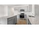 Modern kitchen featuring granite countertops, stainless steel appliances, and light gray cabinets at 1705 Post Oak Dr, Haw River, NC 27258