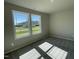 Bright bedroom with large windows providing ample natural light and plush carpeting at 181 Pate Landing Dr, Selma, NC 27576