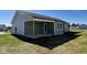 Exterior features covered patio, gray siding and window/door trim at 181 Pate Landing Dr, Selma, NC 27576