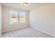 Comfortable bedroom with neutral walls, plush carpet, and natural light streaming through the windows at 197 S Finley Landing Parkway # 85, Smithfield, NC 27577