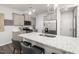 Modern kitchen features stainless steel appliances and an island with a granite countertop at 3402 Pelican Ln, Durham, NC 27703