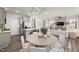 Bright living area adjacent to kitchen, showcases an open layout and modern finishes at 3402 Pelican Ln, Durham, NC 27703
