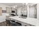 Modern kitchen with stainless steel appliances, granite countertops, and a central island with seating at 3406 Pelican Ln, Durham, NC 27703