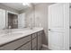 Well-lit bathroom featuring double sinks, modern fixtures, and ample counter space at 3410 Pelican Ln, Durham, NC 27703
