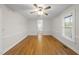 Spacious bedroom with hardwood floors and natural light from window at 4041 Wendy Ln, Zebulon, NC 27597