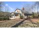 Beautiful exterior view showcasing a charming home with a brick walkway and well-maintained yard at 4041 Wendy Ln, Zebulon, NC 27597