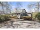 Cozy home exterior with a well-kept lawn, inviting walkway, and lovely landscaping at 4041 Wendy Ln, Zebulon, NC 27597