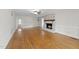 Inviting living room with hardwood floors and a charming fireplace centerpiece at 4041 Wendy Ln, Zebulon, NC 27597