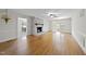 Inviting living room with hardwood floors, stone fireplace, and bright, open space at 4041 Wendy Ln, Zebulon, NC 27597