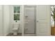 Modern bathroom with a shower, toilet, and vanity with natural light at 406 Queenstown Drive # 24, Kenly, NC 27542