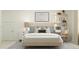Stylish bedroom featuring football themed art, decorative pillows, and a modern shelving unit at 406 Queenstown Drive # 24, Kenly, NC 27542