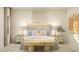 Calm bedroom with a stylish bed, nightstands, lamps, and a decorative rug at 406 Queenstown Drive # 24, Kenly, NC 27542