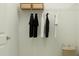 Organized closet with hanging storage and shelving for optimal organization at 406 Queenstown Drive # 24, Kenly, NC 27542