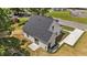 Back aerial view of home with freshly landscaped yard, and outdoor patio area at 412 N Green St, Selma, NC 27576