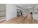 Spacious kitchen features white cabinets, stainless steel appliances, and wood-look floors at 412 N Green St, Selma, NC 27576