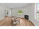 Bright living room featuring a fireplace, recessed lighting, and lots of natural light at 412 N Green St, Selma, NC 27576