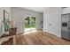 Living room features a sliding glass door, closet space, and access to the staircase at 412 N Green St, Selma, NC 27576
