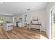 Open-concept room features a console table and is adjacent to the kitchen area at 412 N Green St, Selma, NC 27576