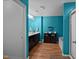 Bright bathroom features dual sinks, dark wood cabinets, and a coordinated color scheme at 434 Golden Villas Dr, Rocky Mount, NC 27809