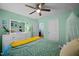 Comfortable bedroom with ceiling fan and natural light, creating a warm and inviting atmosphere at 434 Golden Villas Dr, Rocky Mount, NC 27809