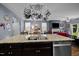 Kitchen island with stainless steel appliances, sink, faucet, and granite countertops at 434 Golden Villas Dr, Rocky Mount, NC 27809