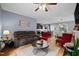 Open concept living room with ceiling fan connected to the kitchen and dining room at 434 Golden Villas Dr, Rocky Mount, NC 27809