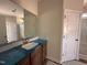 Bathroom featuring modern vanity with a large mirror, and separate shower and toilet at 45 Trescott St, Smithfield, NC 27577