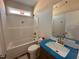 Bathroom featuring tub-shower combo, toilet and vanity at 45 Trescott St, Smithfield, NC 27577