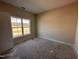 Bright bedroom with natural light from a large window at 45 Trescott St, Smithfield, NC 27577