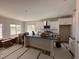 Well-lit kitchen with white cabinets, modern fixtures, and a breakfast bar at 45 Trescott St, Smithfield, NC 27577