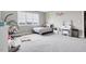 Charming bedroom featuring a hanging chair, plush carpet, and a bright window at 4840 Baines Loop Rd, Spring Hope, NC 27882