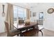 This dining room features natural light, modern light fixture, and wainscoting at 4840 Baines Loop Rd, Spring Hope, NC 27882