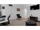 Bright living room with neutral walls, modern decor, and doorway leading to another room at 4840 Baines Loop Rd, Spring Hope, NC 27882