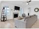 Comfortable living room featuring a fireplace, hardwood floors, and lots of natural light at 4840 Baines Loop Rd, Spring Hope, NC 27882