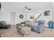 Bright and airy living room with hardwood floors, modern decor, and comfortable seating arrangement at 4840 Baines Loop Rd, Spring Hope, NC 27882