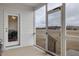 Screened-in porch offering an outdoor space with views of the surrounding landscape at 4840 Baines Loop Rd, Spring Hope, NC 27882