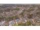 An aerial view of the houses nestled in a wooded neighborhood, providing a sense of community and natural surroundings at 659 Willard Dr, Creedmoor, NC 27522