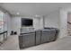 Finished basement featuring a theater setup with a large screen and comfortable seating at 659 Willard Dr, Creedmoor, NC 27522