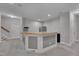Basement wet bar with wooden countertop, neutral carpet, and modern appliances at 659 Willard Dr, Creedmoor, NC 27522