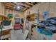 Unfinished basement featuring concrete floors, exposed wood beams, and electrical panel, with storage and workbench potential at 659 Willard Dr, Creedmoor, NC 27522