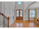 Bright foyer with hardwood floors, staircase, and double front doors at 659 Willard Dr, Creedmoor, NC 27522