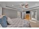 Comfortable main bedroom featuring ensuite bath and walk-in closet with carpeted floor at 659 Willard Dr, Creedmoor, NC 27522