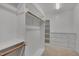 Bright walk-in closet featuring custom shelving and drawers for optimal storage and organization at 659 Willard Dr, Creedmoor, NC 27522